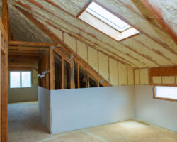 termal insulation installing at the attic insulation of the house